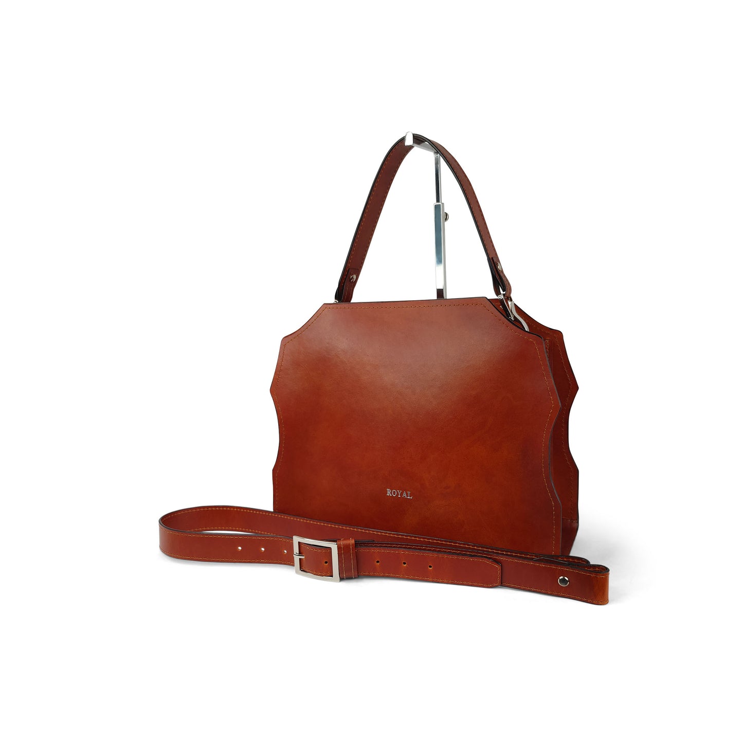 Forgiveness full-grain satchel with shoulder strap, angled view