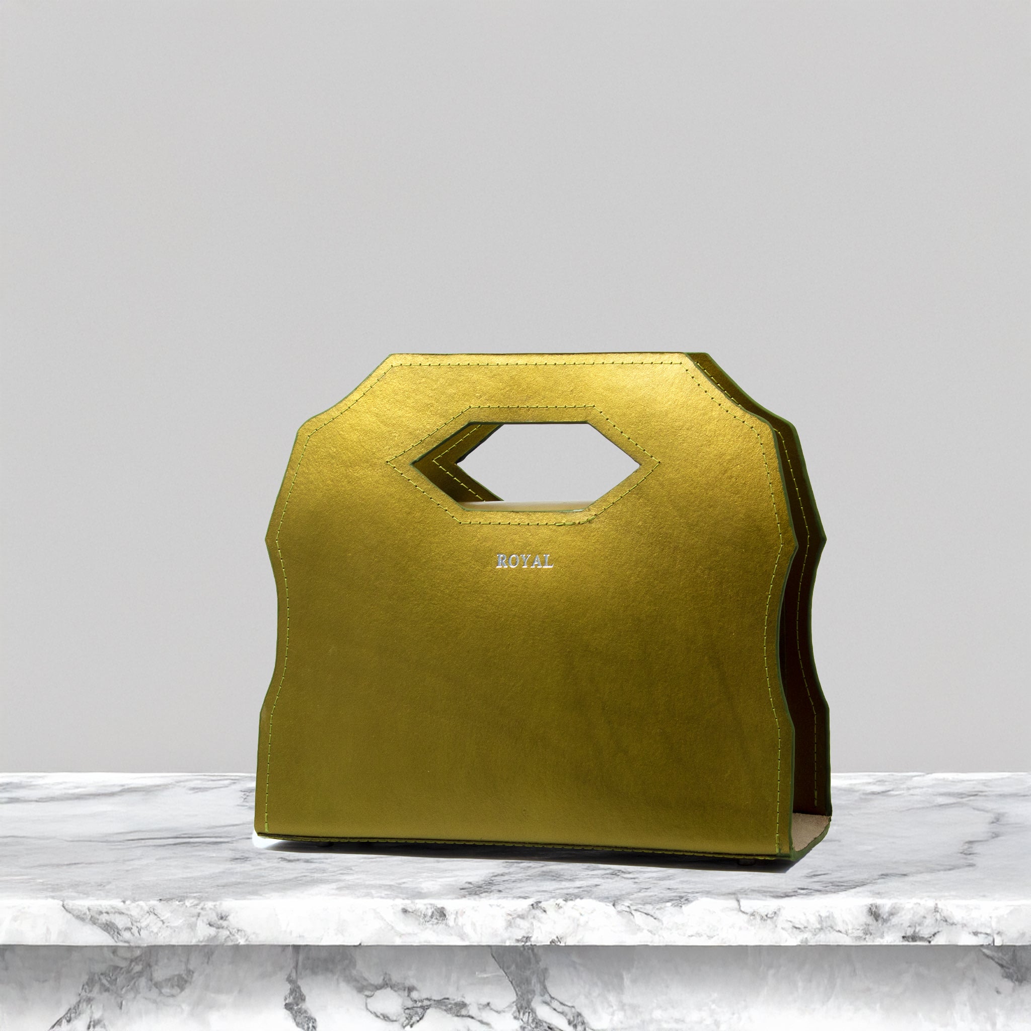 Custom leather satchel with hand‑painted details, designed for carrying essentials with elegance