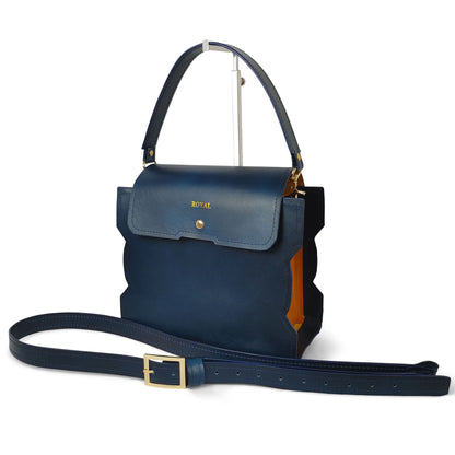 Bless hand painted full-grain satchel, side profile