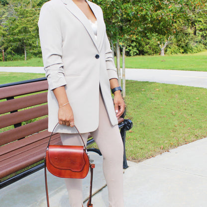 Grace full-grain leather bag, model holding top handle