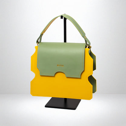 Faith luxury handcrafted bag, angled top handle view